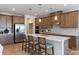 Spacious kitchen with stainless steel appliances, granite countertops, and a large center island at 5911 Wetlands Aly, Charlotte, NC 28215