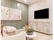 Well-designed living room with modern art, a television, and tasteful decor at 5911 Wetlands Aly, Charlotte, NC 28215
