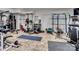 Home gym featuring weight training equipment, workout mats, and ample space for exercise at 6823 Manatee Dr, Concord, NC 28025
