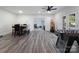 Recreation room featuring a dining table, foosball table and adjacent work-out room with French doors at 6823 Manatee Dr, Concord, NC 28025