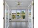 Bright sun room offering a beautiful lake view and abundant natural light at 6823 Manatee Dr, Concord, NC 28025