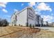 New two-story townhome featuring a two-car garage, and low maintenance landscaping at 8023 Downy Oak Ln, Charlotte, NC 28269