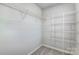 This walk-in closet offers ample storage space with its well-organized wire shelving units at 8023 Downy Oak Ln, Charlotte, NC 28269