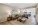 Comfortable living room with modern decor, wood floors, and an open layout at 8031 Downy Oak Ln, Charlotte, NC 28269