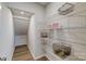 Walk-in pantry with ample shelving for organized storage of groceries and kitchen essentials at 8031 Downy Oak Ln, Charlotte, NC 28269