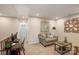 Upstairs sitting area features a comfortable couch, side tables, and natural light at 8031 Downy Oak Ln, Charlotte, NC 28269