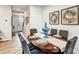 Dining area has an oval table with seating for six under decorative wall art at 8035 Downy Oak Ln, Charlotte, NC 28269