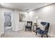 Sitting room featuring a pair of navy velvet chairs and neutral paint at 8035 Downy Oak Ln, Charlotte, NC 28269