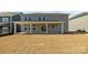 Expansive backyard featuring a covered patio, ideal for outdoor enjoyment at 845 Regulus Ct, York, SC 29745