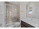 Well-lit bathroom featuring a glass-enclosed shower and a vanity with a sink at 845 Regulus Ct, York, SC 29745