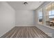 Bright bedroom with hardwood floors and large windows offering plenty of natural light at 845 Regulus Ct, York, SC 29745