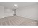 Large bonus room featuring neutral carpet and light-colored walls, perfect for entertainment at 845 Regulus Ct, York, SC 29745