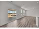 Bright living room with sliding glass doors, hardwood floors, and lots of natural light at 845 Regulus Ct, York, SC 29745