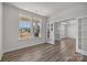 Bright and airy room with hardwood floors, featuring views into another room at 845 Regulus Ct, York, SC 29745