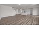 Spacious open floor plan showcases modern kitchen, living area and staircase to the second floor at 845 Regulus Ct, York, SC 29745