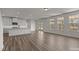Bright living space features hardwood flooring, recessed lighting, and large windows at 845 Regulus Ct, York, SC 29745