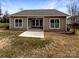 Spacious backyard featuring a patio and green grass at 8804 Artesa Mill Ln, Charlotte, NC 28214