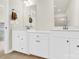 Bright bathroom with double sinks and white cabinets, providing ample space and modern comfort at 112 August Ln, Matthews, NC 28104