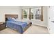 Cozy bedroom with a comfortable bed, neutral walls, and bright natural light at 112 August Ln, Matthews, NC 28104