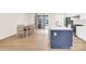 Bright kitchen featuring an island, modern appliances, and an adjacent dining area at 112 August Ln, Matthews, NC 28104