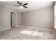Bedroom featuring carpet flooring and natural light streaming through the windows at 146 Stibbs Cross Rd, Mooresville, NC 28115