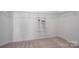 Walk-in closet with installed shelving at 146 Stibbs Cross Rd, Mooresville, NC 28115