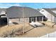 Aerial view of the backyard, with a screened patio, lawn, and a view of the neighborhood at 1496 Imperial Ct, York, SC 29745