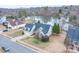 Aerial view of a home on the lake, highlighting curb appeal and mature landscaping at 1750 Williamsburg Dr, Rock Hill, SC 29732
