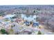 Aerial view of lakeside community, showcasing homes with easy lake access at 1750 Williamsburg Dr, Rock Hill, SC 29732