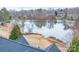 Aerial view showing the home with lake access, set amidst mature trees and peaceful surroundings at 1750 Williamsburg Dr, Rock Hill, SC 29732