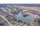 Aerial view of neighborhood with pond, showcasing the property's waterfront location at 1750 Williamsburg Dr, Rock Hill, SC 29732