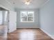 Bedroom with wood flooring, and large window overlooking the neighborhood at 1750 Williamsburg Dr, Rock Hill, SC 29732