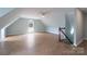 Spacious bonus room featuring natural light and an open staircase at 1750 Williamsburg Dr, Rock Hill, SC 29732