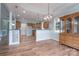 Open-concept dining area with decorative lighting and hardwood floors at 1750 Williamsburg Dr, Rock Hill, SC 29732