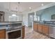 Kitchen with stainless steel oven, wood floors and a view into the dining area at 1750 Williamsburg Dr, Rock Hill, SC 29732