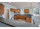Well-maintained kitchen with wood cabinetry and modern appliances at 1750 Williamsburg Dr, Rock Hill, SC 29732