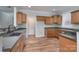 Traditional kitchen featuring wood cabinets and dark countertops at 1750 Williamsburg Dr, Rock Hill, SC 29732