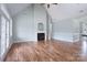 Spacious living room with fireplace, ceiling fan, and hardwood floors at 1750 Williamsburg Dr, Rock Hill, SC 29732