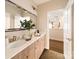 Bathroom featuring a double vanity with modern fixtures and a large mirror at 2016 Thatcher Way, Fort Mill, SC 29715
