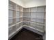 Walk-in closet with built-in shelving, providing ample storage space at 2016 Thatcher Way, Fort Mill, SC 29715