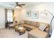 Cozy living room featuring a sectional sofa, desk, and accent lighting at 2016 Thatcher Way, Fort Mill, SC 29715