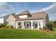 Covered outdoor patio for entertaining, with backyard view and ample seating at 2016 Thatcher Way, Fort Mill, SC 29715