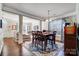 Spacious dining area with dark hardwood floors and an open concept design at 2024 Woodshorn Dr, Matthews, NC 28104