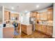 Well-equipped kitchen with stainless steel appliances and granite countertops at 2024 Woodshorn Dr, Matthews, NC 28104