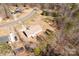 Aerial view of the house showing the backyard deck and surrounding mature trees at 2070 Hunters Ridge Rd, Lancaster, SC 29720