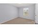 Bedroom featuring a light blue paint, window, and outlets at 2070 Hunters Ridge Rd, Lancaster, SC 29720