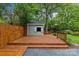 Large wooden deck in a private backyard, perfect for outdoor entertaining at 2115 Laburnum Ave, Charlotte, NC 28205