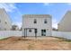 Spacious backyard featuring a concrete patio and a charming pergola, ideal for outdoor entertaining at 225 Final Stretch Ln, Clover, SC 29710