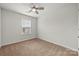 Bedroom with neutral carpet, a window and ceiling fan at 225 Final Stretch Ln, Clover, SC 29710