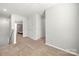 Hallway landing area upstairs that has carpet, white trim and white walls at 225 Final Stretch Ln, Clover, SC 29710